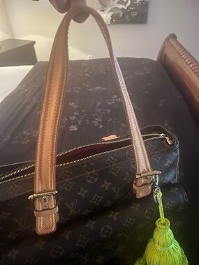 Louis Vuitton Monogram Shoulder Bag with Tan Leather Handles and Yellow Tassel